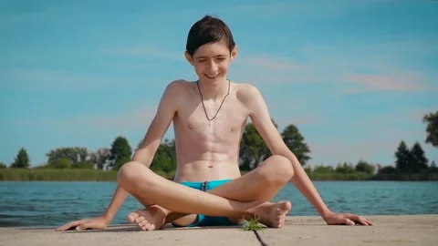 Young boy first time practice yoga and oriental relaxation and meditation Stock Footage 204865847