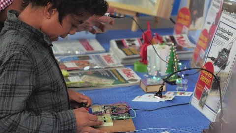 Young boy gaming at public maker space Stock Footage 83202014
