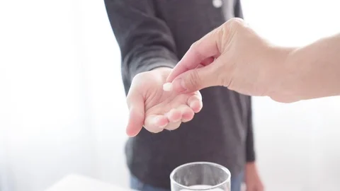 Young boy get a pill Vídeos de archivo 104330051