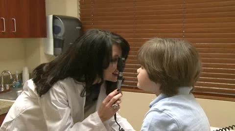 Young boy gets his checkup Stock Footage 10565354