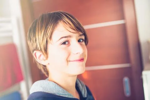 Young boy getting ready in the mirror before leaving home New day of ordinary Stock-Fotos