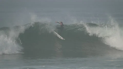 Young boy grom kid surfer surfing ocean waves at Huntington Beach Video stock 221402398