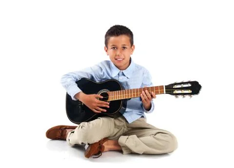 Young boy with a guitar Stock Photos