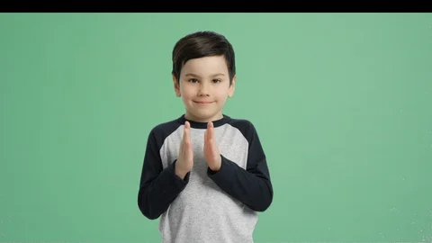 Young boy hand clap - Alpha Channel, Green Screen Stock Footage 129348063