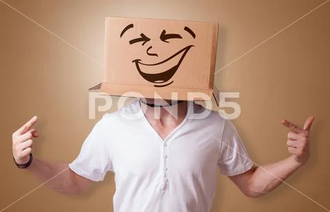 Young boy with happy cardboard box face ~ Premium Photo #111552894