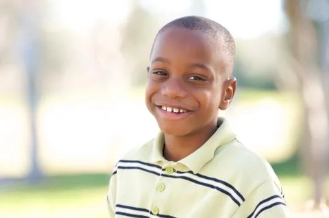 Young Boy Having Fun In The Park Stock Photos