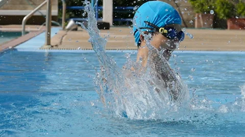 Young boy having fun at pool Stock Footage 58846675