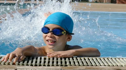 Young boy having fun at pool Stock Footage 58847816