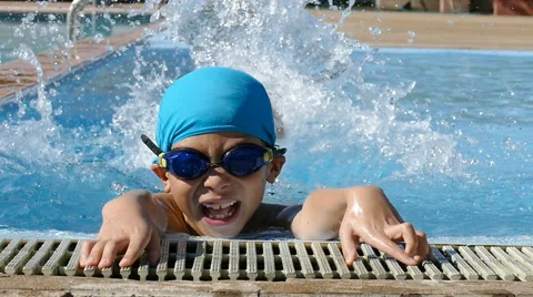 Young boy having fun at pool Stock Footage 58866016
