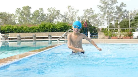 Young boy having fun in swimming pool Stock Footage 62202295