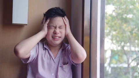 Young boy having headache,slow motion. Stock Footage 108645865