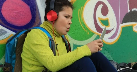 Young boy with headphone using digital tablet 6 Stock Footage 87825622