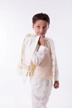 Young boy with his jacket over his shoulder Stock Photos