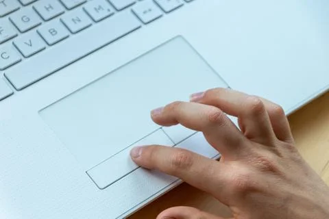 Young boy is learning to code and program at a white notebook Stock Photos