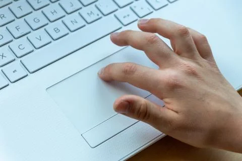 Young boy is learning to code and program at a white notebook Foto stock