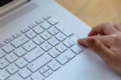 Young boy is learning to code and program at a white notebook Stock Photos