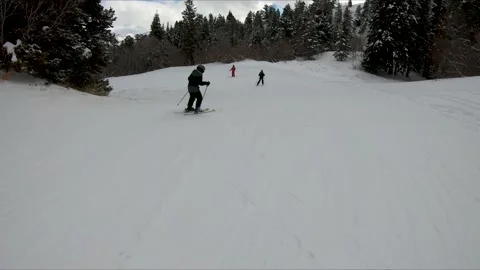 Young boy learning to ski with instructor 스톡 동영상 168855498