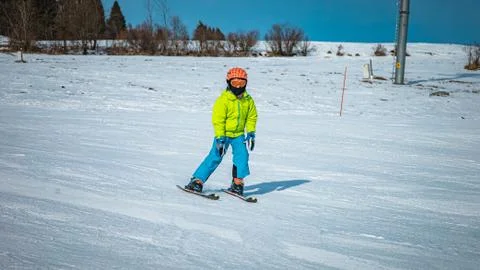 Young boy learning to ski on na slope in Slovakia Stock Photos