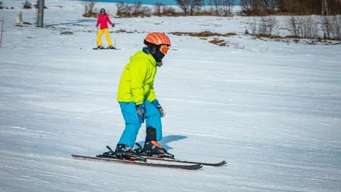 Young boy learning to ski on na slope in Slovakia Stock Photos