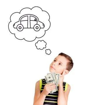 Young boy looking up and thinking to buy a car with his money Stock Photos