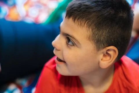 Young boy looking away with thoughtful expression Stock Photos