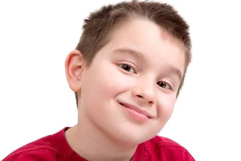Young boy looking at camera appreciatively Stock Photos