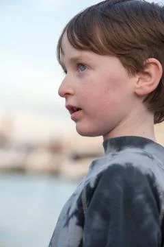 Young boy looking off into the distance Stock Photos