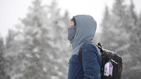 Young boy looking in the sky while snowing Stock-Footage 174742109