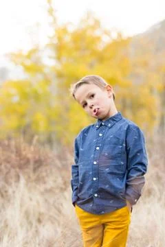 Young boy makes silly face at camera Stock Photos