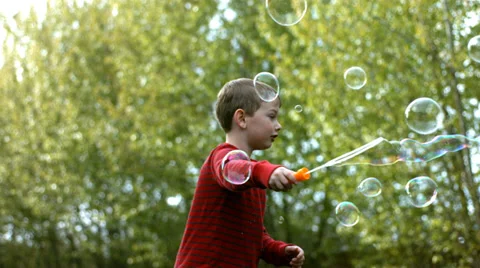 Boy Bubbles Stock Footage ~ Royalty Free Stock Videos | Pond5