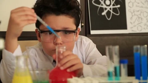 Young boy making science experiments 6 Stock Footage 72936910