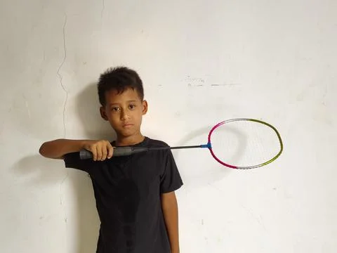 Young boy making a stop or rejection gesture with crossed arms 库存照片