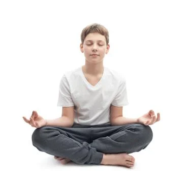 Young boy meditating Stock Photos