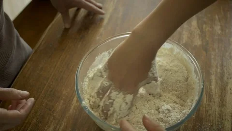 Young boy mixing ingredients Stock Footage 76791709