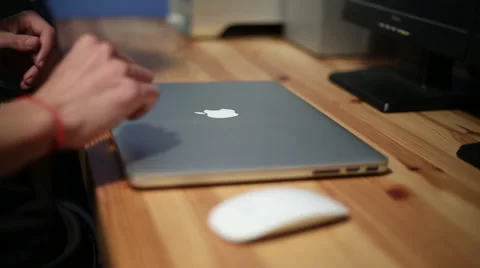 Young boy opening laptop typing on Keyboard mac, computer spanish keyboard -Dan Stock-Footage 46701158