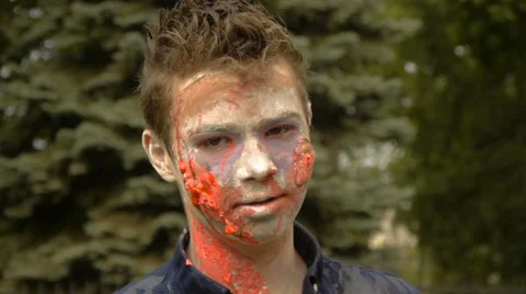 Young boy with painted face, zombie, close-up, Halloween Stock Footage 68209197