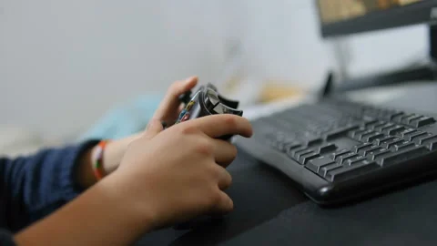 Young boy play competitive game at home,computer videogames tech addiction 4K Video stock 232343186