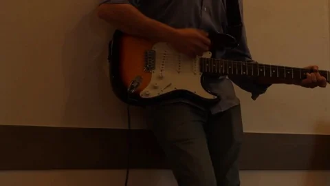 Young boy play guitar Stock Footage 75382454