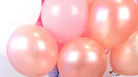 Young boy is playing with air balloon 動画素材 125909655