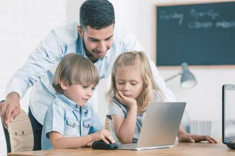 Young boy playing computer game 스톡 사진