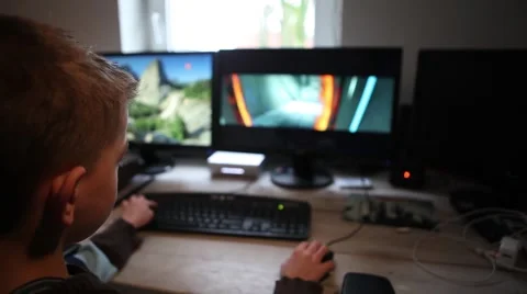 Young boy playing computergame Stock Footage 46401362