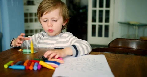 Young Boy Playing With Crayons Stock Footage 100042026