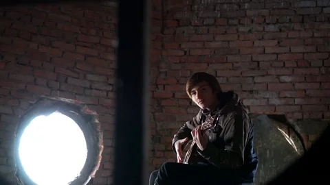 Young boy playing a guitar Stock Footage 70558677