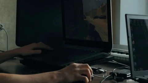 Young boy playing on laptop Stock Footage 69866082