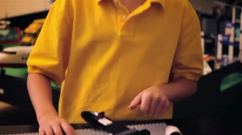 Young boy playing with Lego Set Video stock 19034685