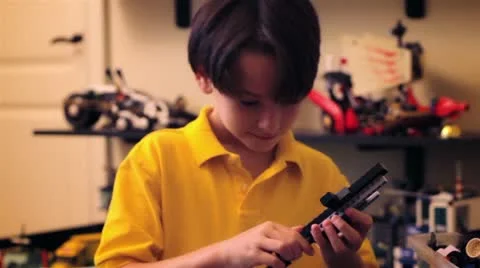 Young boy playing with Lego Set Video stock 19044287
