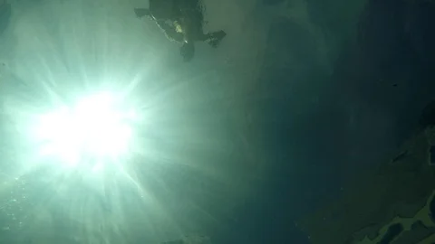 Young boy playing in the summer pool, with sports camera, water Vidéo 117060545