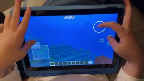 A young boy plays games on a tablet Stock-Footage 291716480