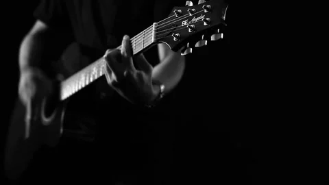 A young boy plays a guitar Video stock 145508754