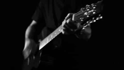 A young boy plays a guitar Video stock 145508764